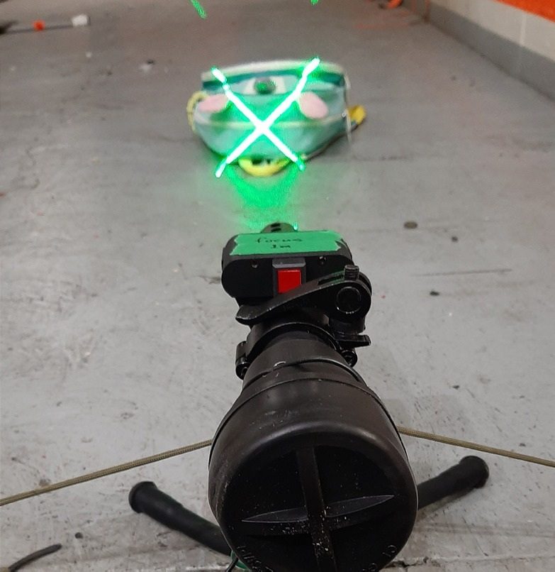 Dagger Zero Convergence laser aiming system projected on a target