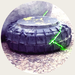 Zero Convergence laser aimed at an anti-tank mine on the ground