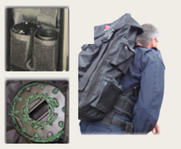 Baldric Backpack interior pouches holding disrupter components, and the pack worn and unfolded on an operator